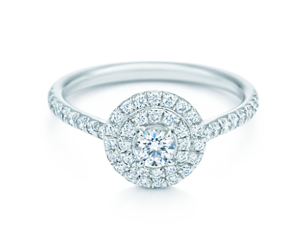 Tiffany & Co. Soleste Round - £3,475. I'm a huge fan of detailed engagement rings and this target ring featuring 0.47ct of central round brilliant diamond encircled by a double row bead-set diamonds is simply stunning. Those surrounding diamonds will only serve to accentuate the size and beauty of the central diamond and dazzle any lucky on-looker.